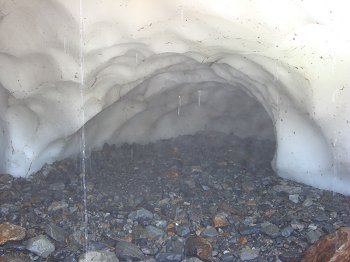 The start of an ice cave, misty